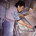 Making paper using a mold and deckle.