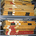 Large, heavy books stacked too high can be damaged during retrieval and replacement. Make sure a clean surface is nearby on which to place the large volumes.