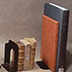 Bookends should be a similar size to the books they are supporting. Whenever possible, non-knifing bookends should be used.