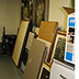 Framed items should not be stored on the floor, propped against a wall unsupported, or in direct contact with each other.